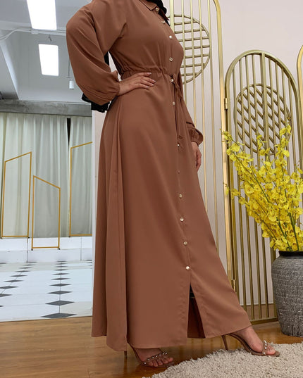 Full-button dress with a neat lapel