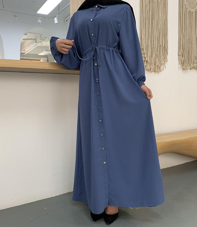 Full-button dress with a neat lapel