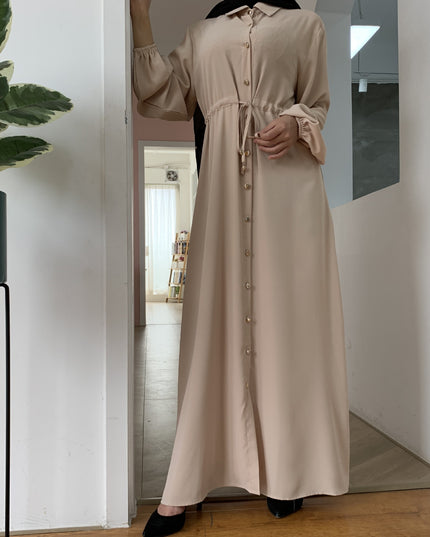 Full-button dress with a neat lapel