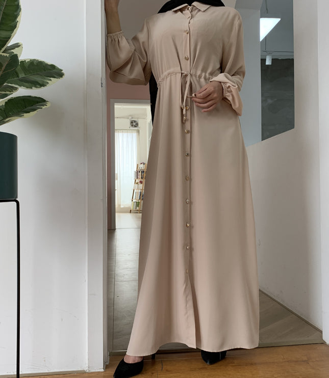 Full-button dress with a neat lapel