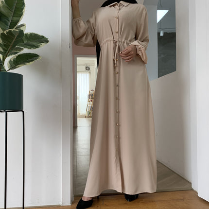 Full-button dress with a neat lapel
