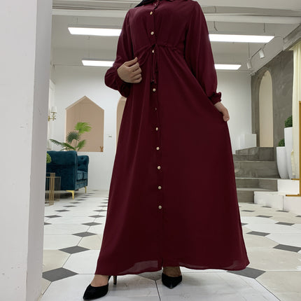 Full-button dress with a neat lapel